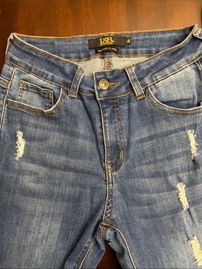 Women’s L&B Light Blue Distressed Mid-Rise Flare Jeans